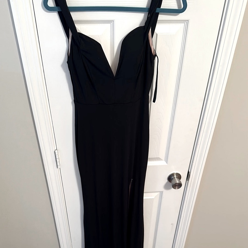 Black off the shoulder, dress with a slit down the leg
